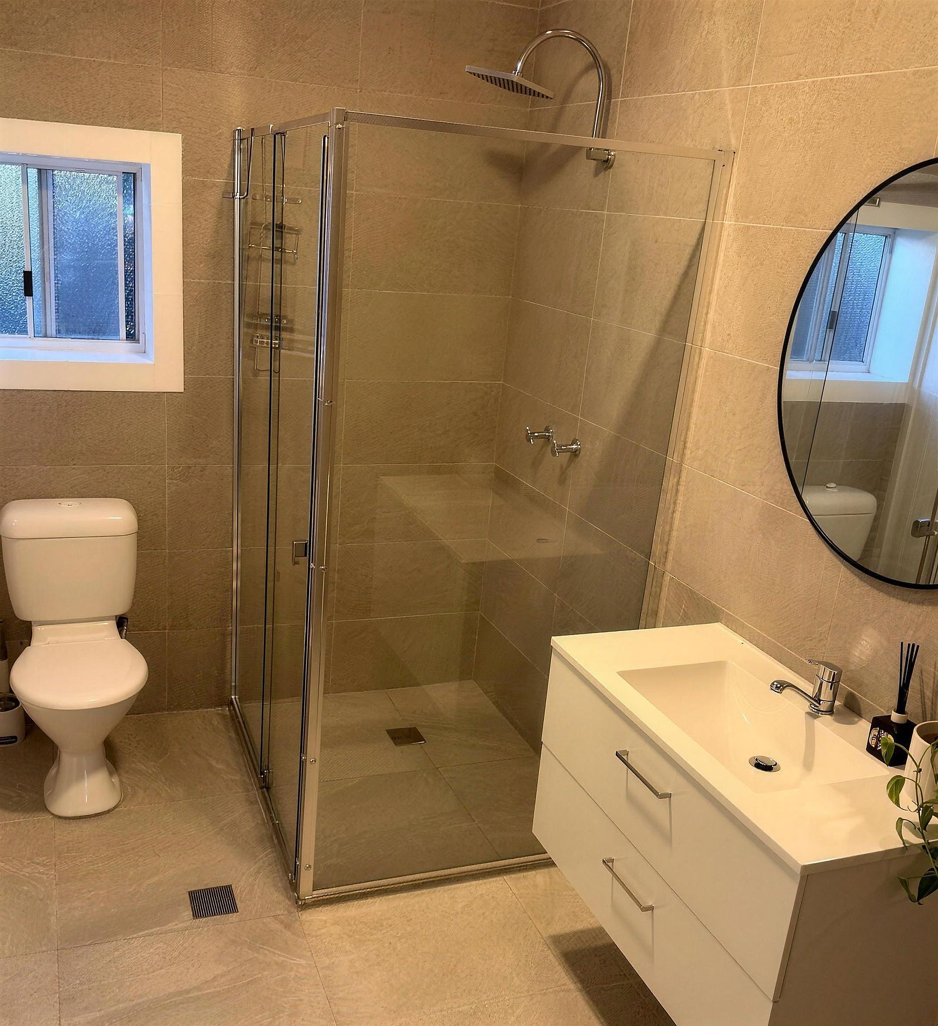 Bathroom with shower and vanity