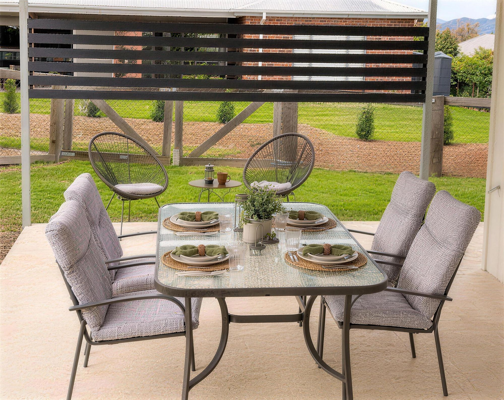 Outdoor dining setting with Mudgee wine-country views